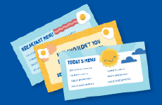 Three colorful school meal menus on a blue background. The menus include cheerful designs with breakfast and lunch items, sunny weather themes, and playful food illustrations like eggs and bacon.