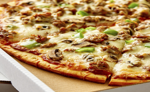 A tavern-style pizza made with BONICI® parbaked pizza crust.